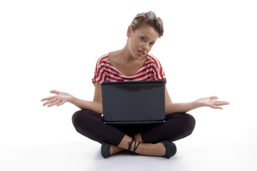 sitting woman holding laptop against white background