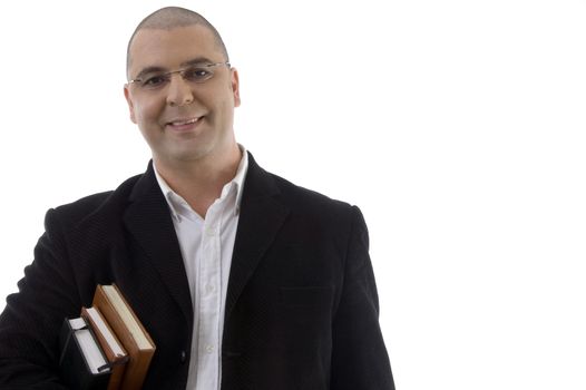 smiling businessman with books on an isolated background