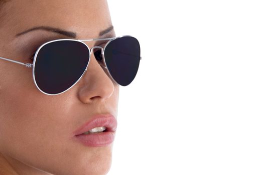 close view of model wearing sunglasses with white background