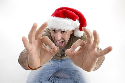 happy man wearing christmas hat against white background