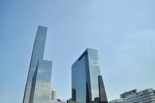 Skyscrapers complex reflects cloud and sky