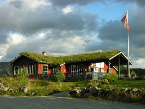 Road to Preikenstolen, alone refreshment point with clouds, Norway