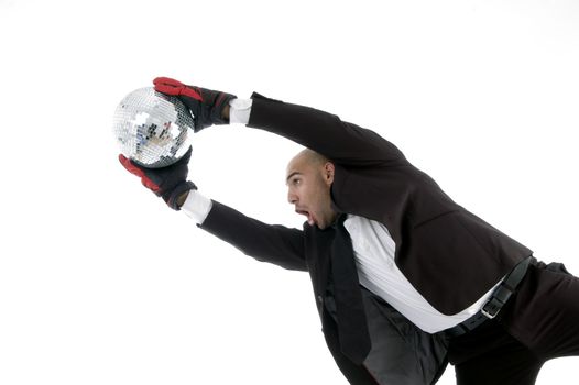 handsome young attorney catching disco ball on an isolated white background