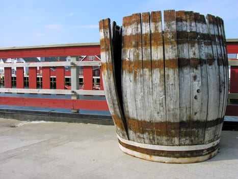 Old ruined barrel in exterior seaport, Norway