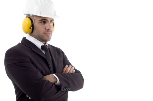 folded arm engineer wearing earplugs on an isolated background