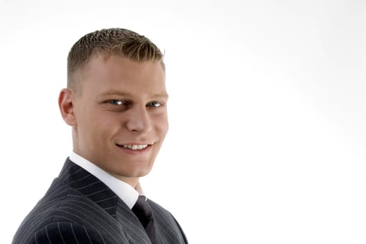 close up of smiling young manager on an isolated white background