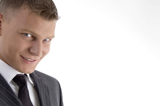 close up of handsome young man looking at camera with white background