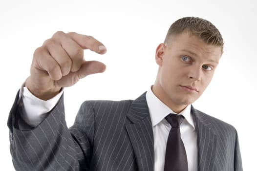 businessman showing measuring gesture on an isolated background