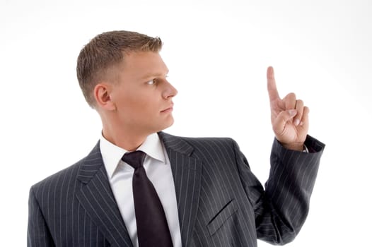 portrait of businessman looking finger against white background