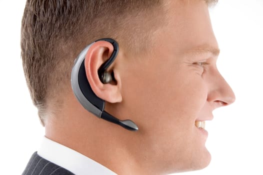 close up view of man wearing headset on an isolated background