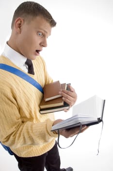 smart student managing his books on an isolated white background