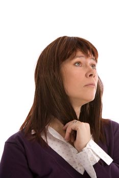 Adult woman looking sideways lost in thought