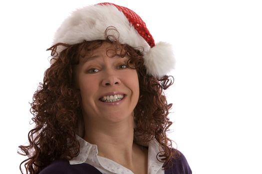 Pretty mature woman wearing a christmas hat with a big smile