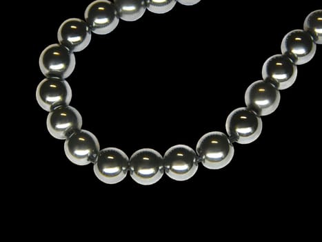 Isolated chrome beads on the black background