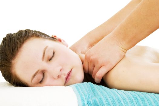 A close up image of a woman receiving a shoulder and back massage.