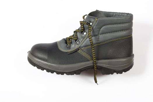 new black footwear, equipment for workers on white background