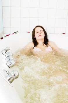 Relaxing in a jet tub at a day spa in a cure bath, a little taste of luxury.