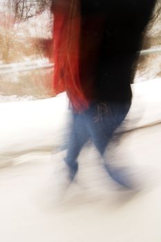 A motion blur abstract of a person walking in a hurry, a late rushing concept image.