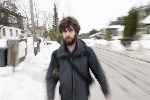 A motion blur abstract of a person walking in a hurry, a late rushing concept image.