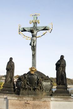 Statue on the Charles Bridge of Christ on the cross, Prague, Czech Republic