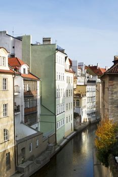 Abstract building detail in Prague, Czech Republic.  This small flow of water looks a lot like venice.