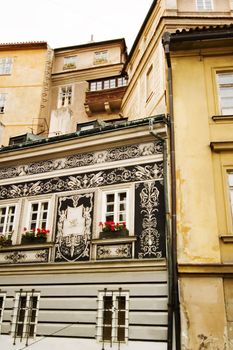A small skinny street detail in the old town area of Prague, Czech Republic.