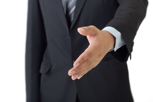 Closeup of young business man's hand greeting you , isolated on white background.