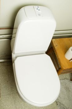 An interior shot of a european bathroom showing the toilet