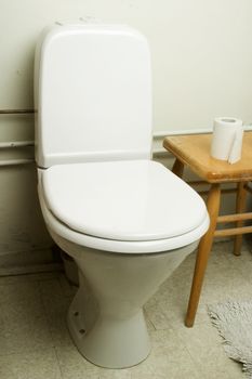 An interior shot of a european bathroom showing the toilet