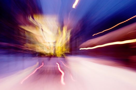 An Oslo street car at night with motion blur.