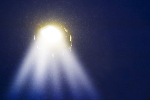 A night sky with a 'ufo'.