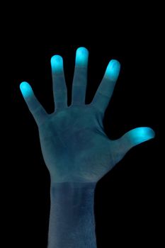 A hand being scanned for finger prints.