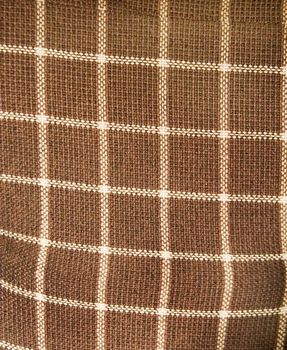 An old plaid couch texture background image.