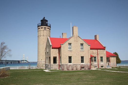 Bright sunny morning for Lake Huron light and famous Michigan bridge