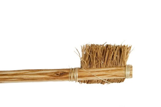 A large very rough bristle tooth brush.