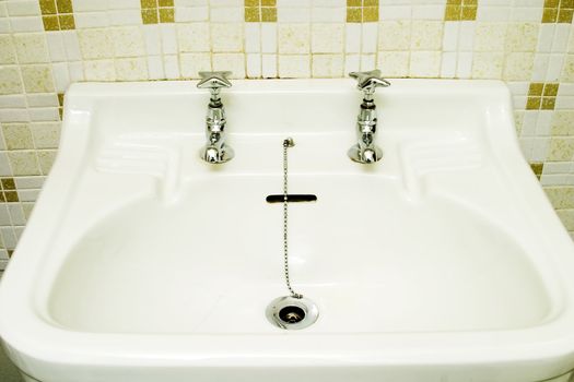 An old fashioned bathroom sink.