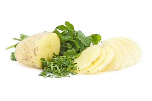 Sliced Potato, herbs and crisps isolated on a white background