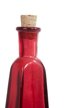 A red glass bottle isolated on white with clipping path.
