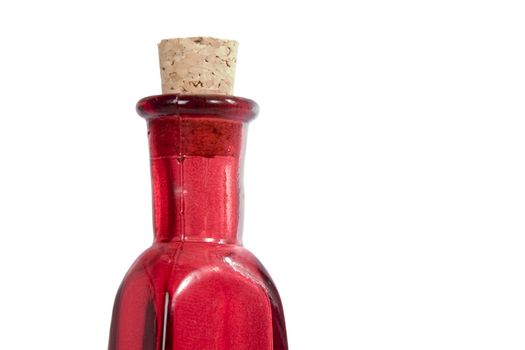 A red glass bottle isolated on white with clipping path.