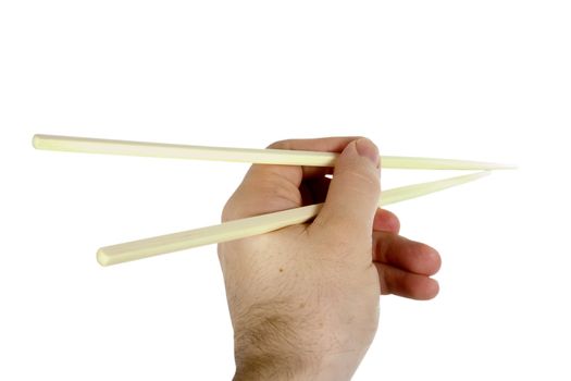 A males hand using chopsticks, isolated on white with clipping path.