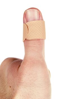 A bandage on the thumb.  Isolated on white with clipping path.