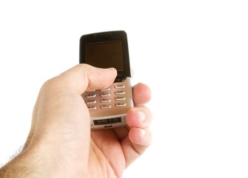 A hand text messaging with a cell phone, isolated on white with a clipping path.