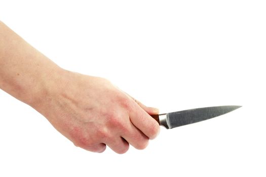 A small pearing knife in a female hand, ready to cut something.  Isolated on white with clipping path.