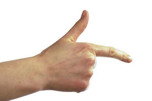 An adult female hand pointing with the thumb in the air, making a gun shape