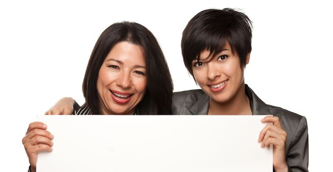 Attractive Multiethnic Mother and Daughter Holding Blank White Sign Isolated on a White Background.