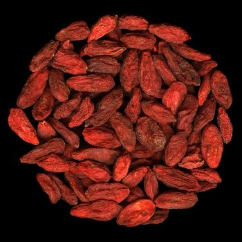 a pile of dried Tibetan goji berries (wolfberry) on black