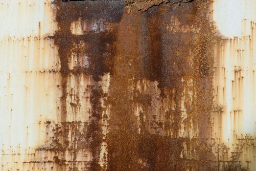 Grunge texture, a rusted metal backdrop with flaky paint.