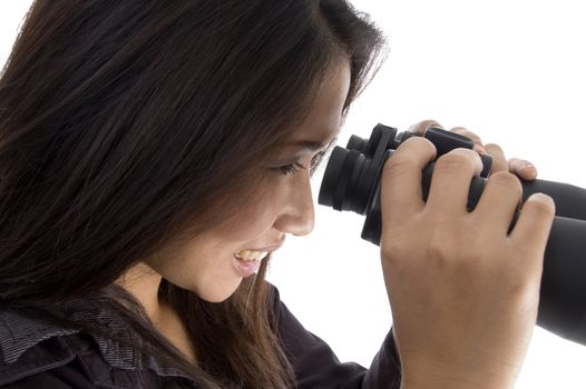 female looking through binocular on an isolated white background