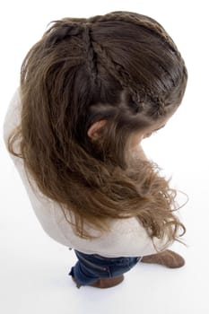 young female posing with stylist hairstyle on an isolated white background