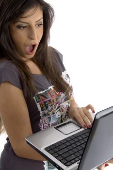 woman holding laptop against white background
